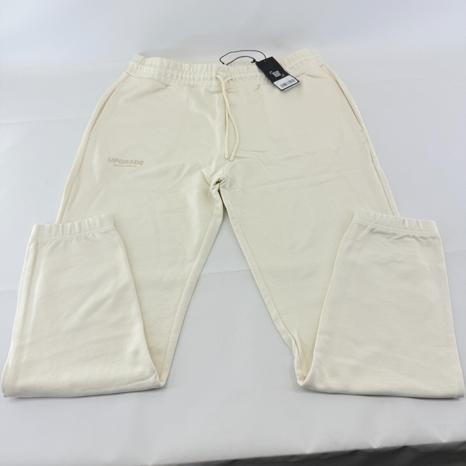 Castore Upgrade Mens Active Reverse Weave Joggers in Cream size XL New with Tags