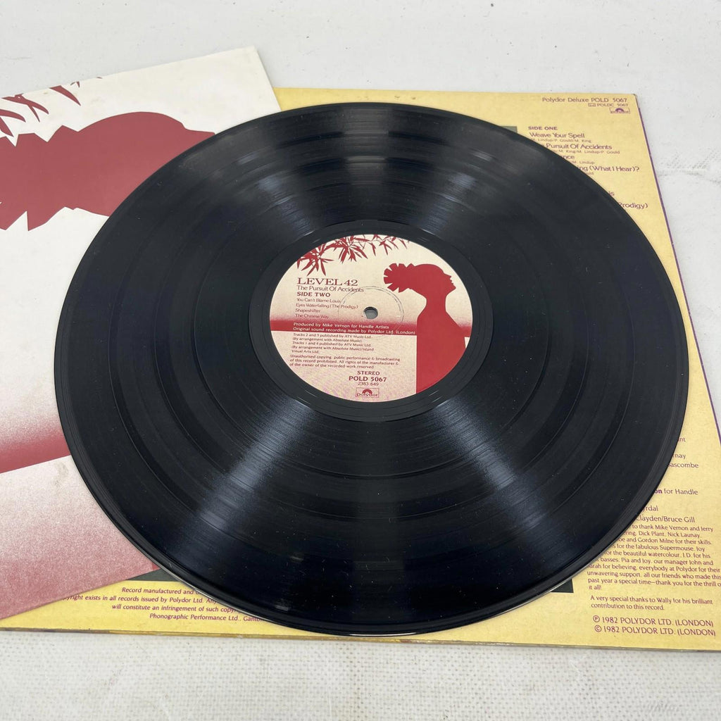 Level 42 - The Pursuit Of Accidents 1982 12” Vinyl LP ERecord X/VG