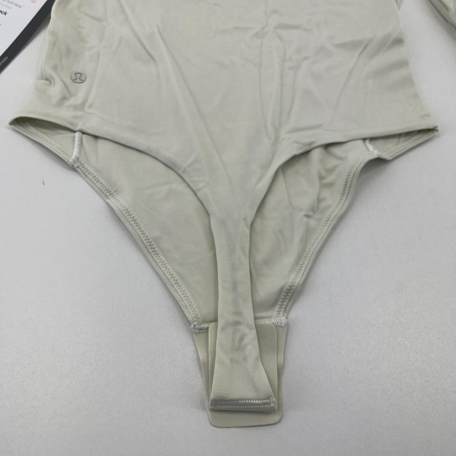 Lululemon Wundermost Soft Nulu Turtleneck Bodysuit Bone White XS See Details