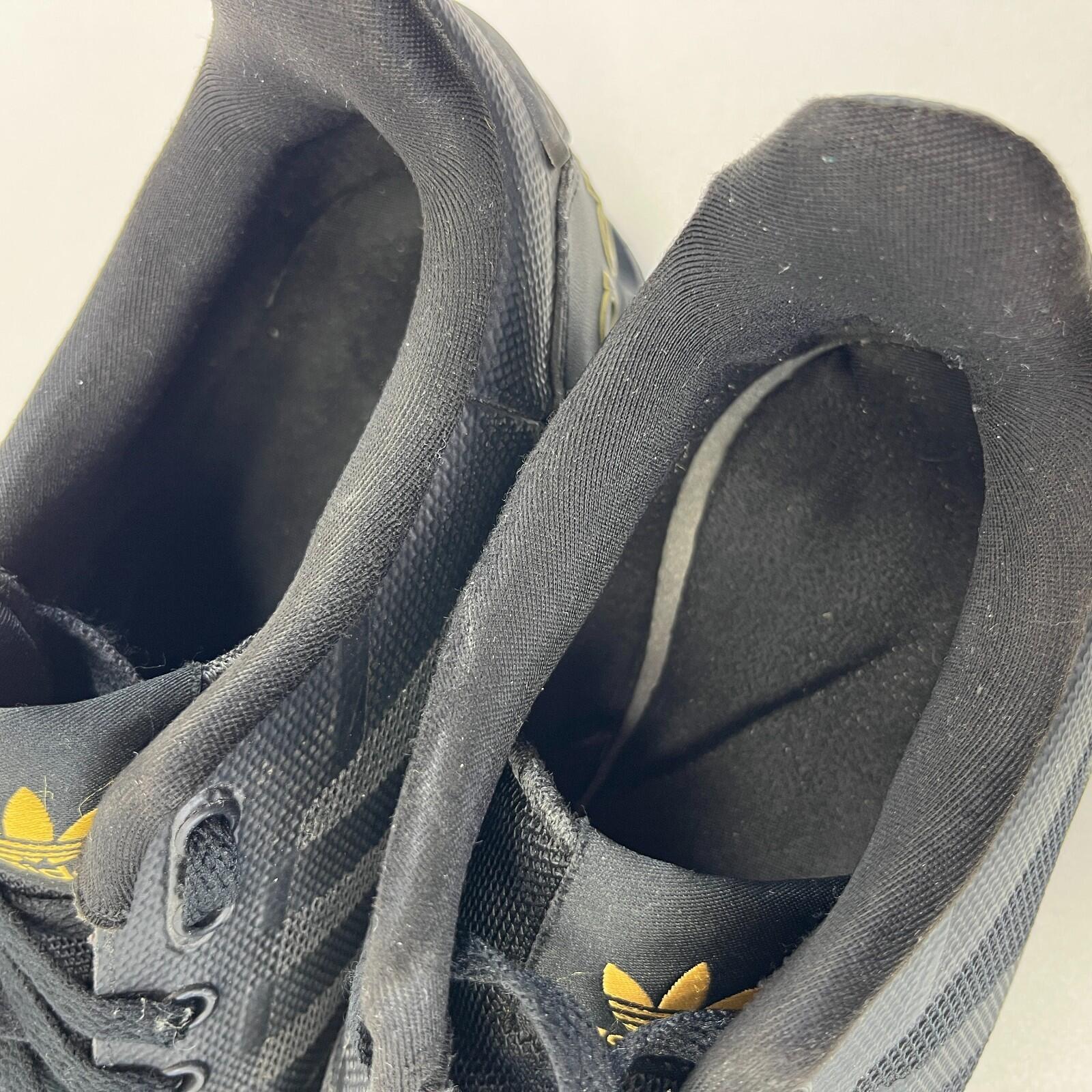 Adidas LA Trainer II Trainers in Black & Gold UK 7 / EU 40 2/3