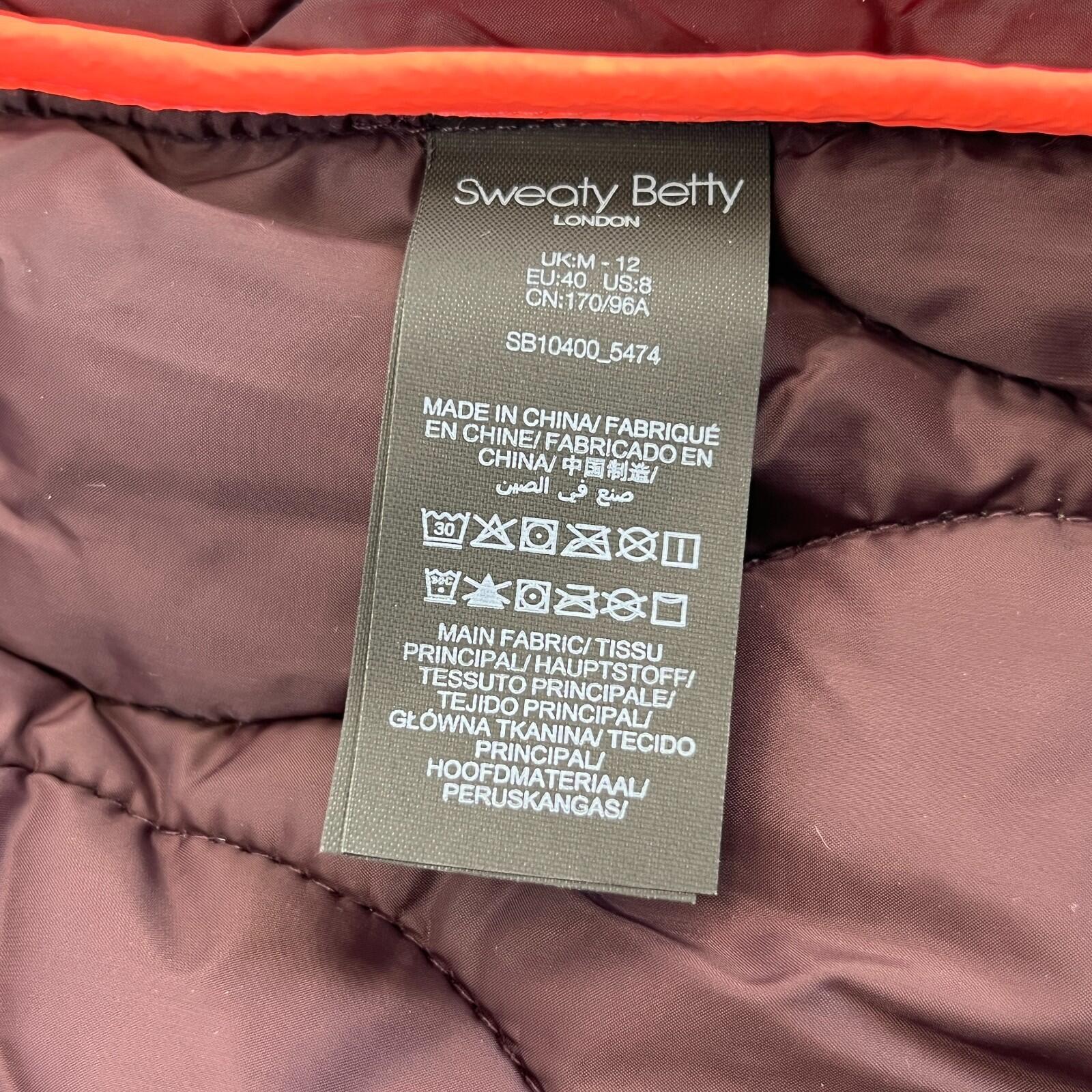 Sweaty Betty On The Move Longline Quilted Parka Coat in Sable Brown size M/12
