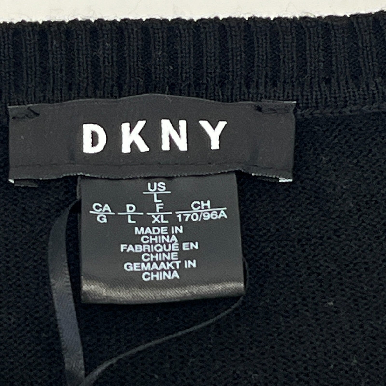 DKNY Women's Tight Knit Jumper Sweater size Large in Black with Spellout