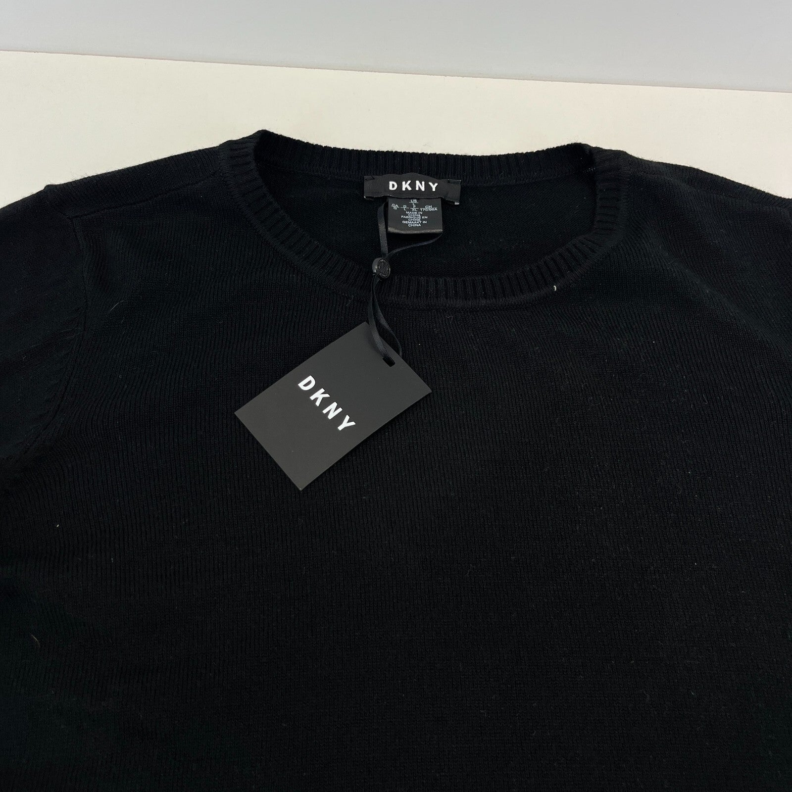 DKNY Women's Tight Knit Jumper Sweater size Large in Black with Spellout