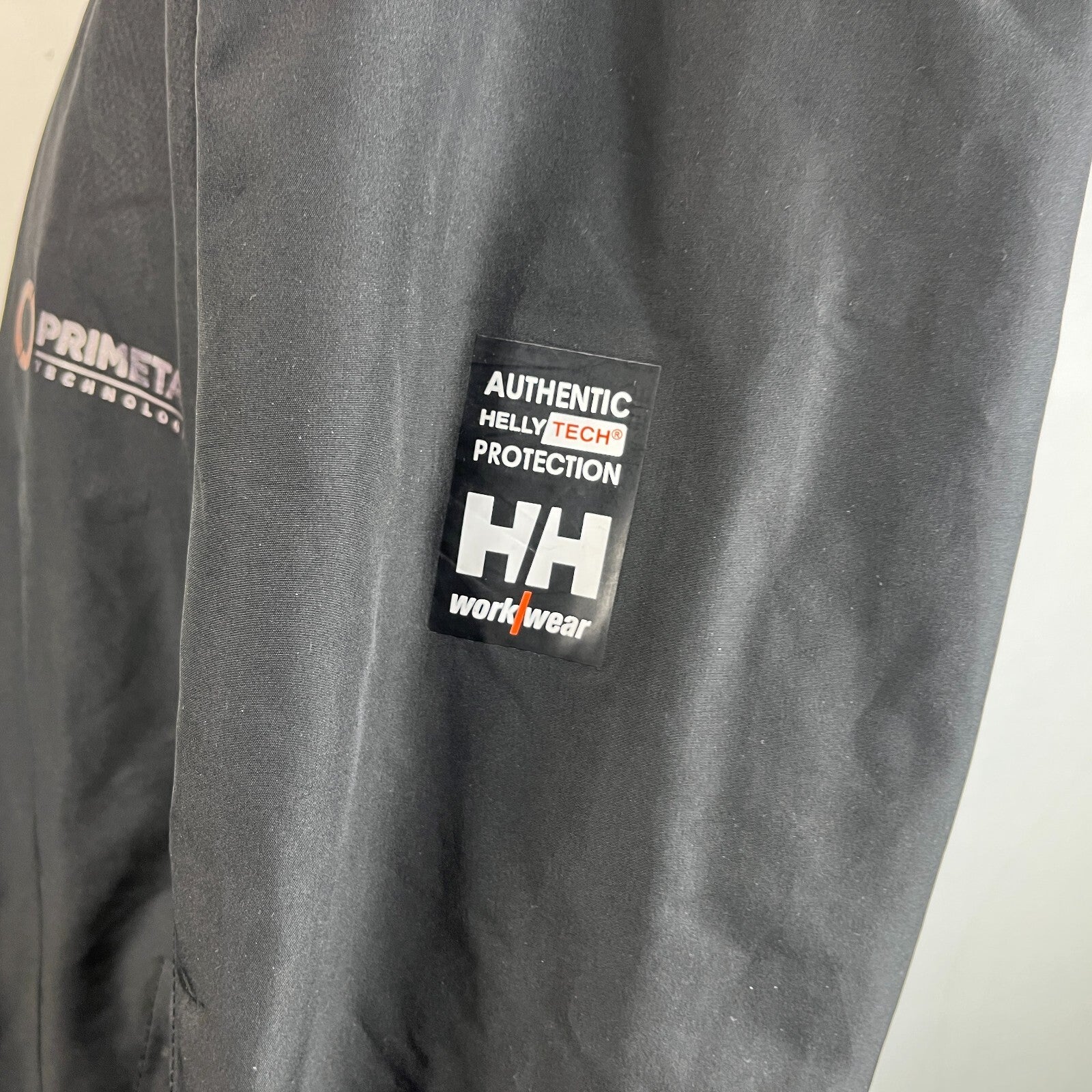 Helly Hansen Helly Tech Workwear Hooded Waterproof Jacket in Black size XL