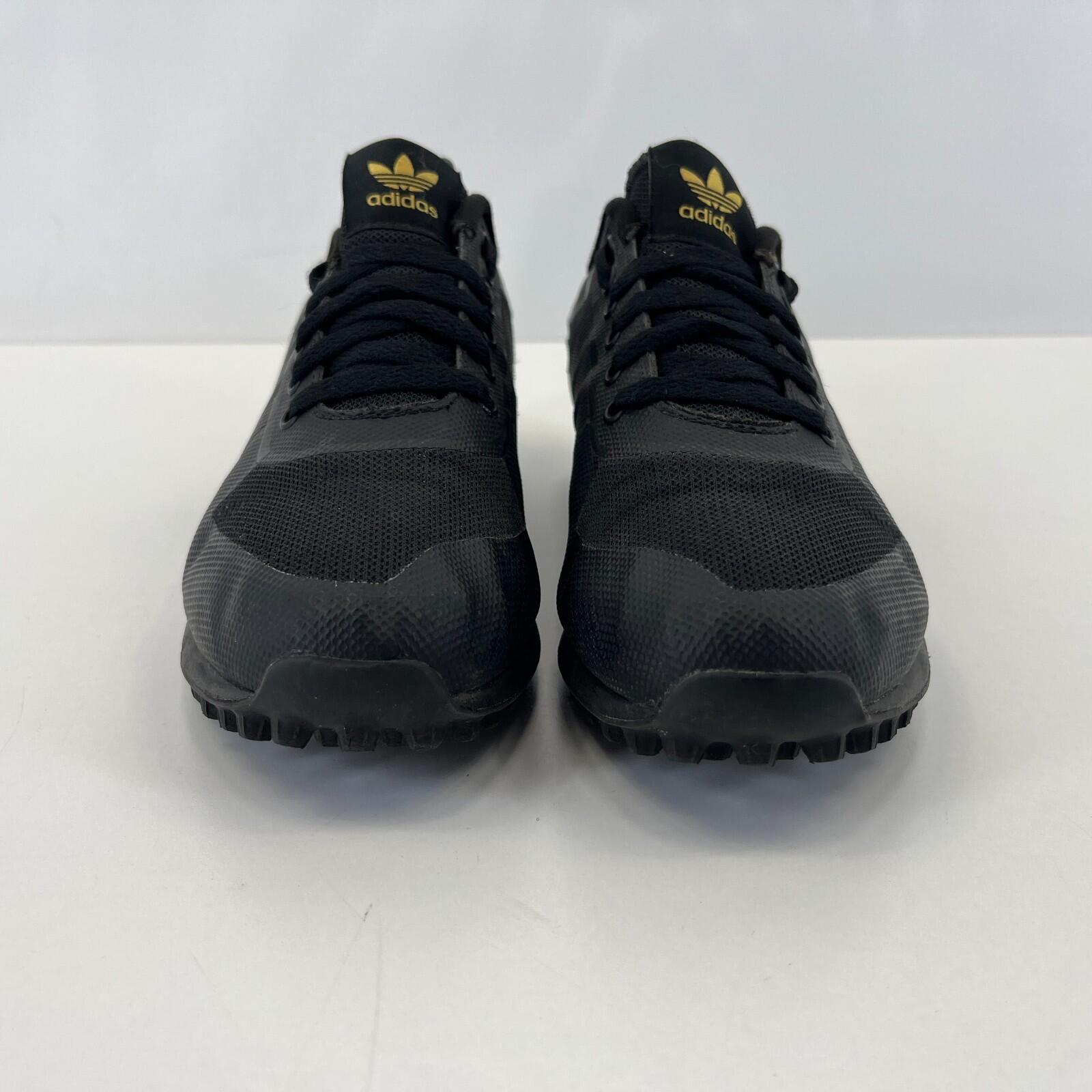 Adidas LA Trainer II Trainers in Black & Gold UK 7 / EU 40 2/3