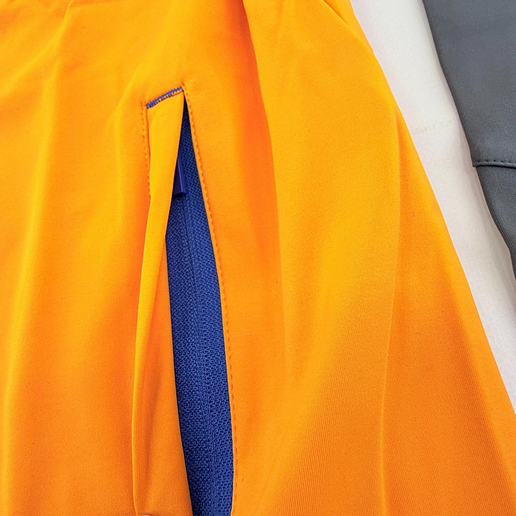 Castore Women’s Soft Shell Training Jacket in Orange & Black size 18