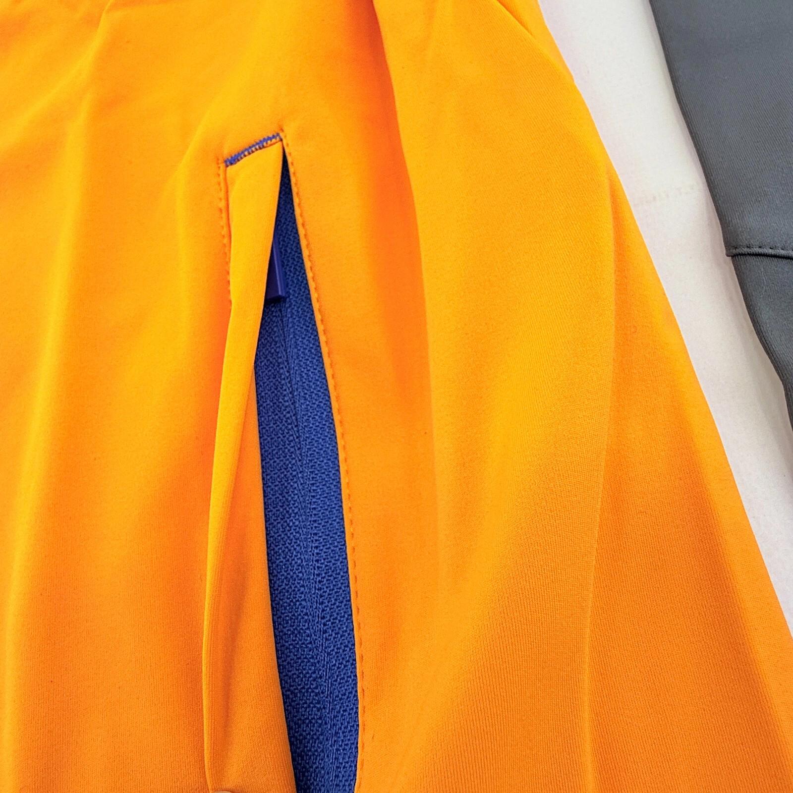 Castore Women’s Soft Shell Training Jacket in Orange & Black size 18