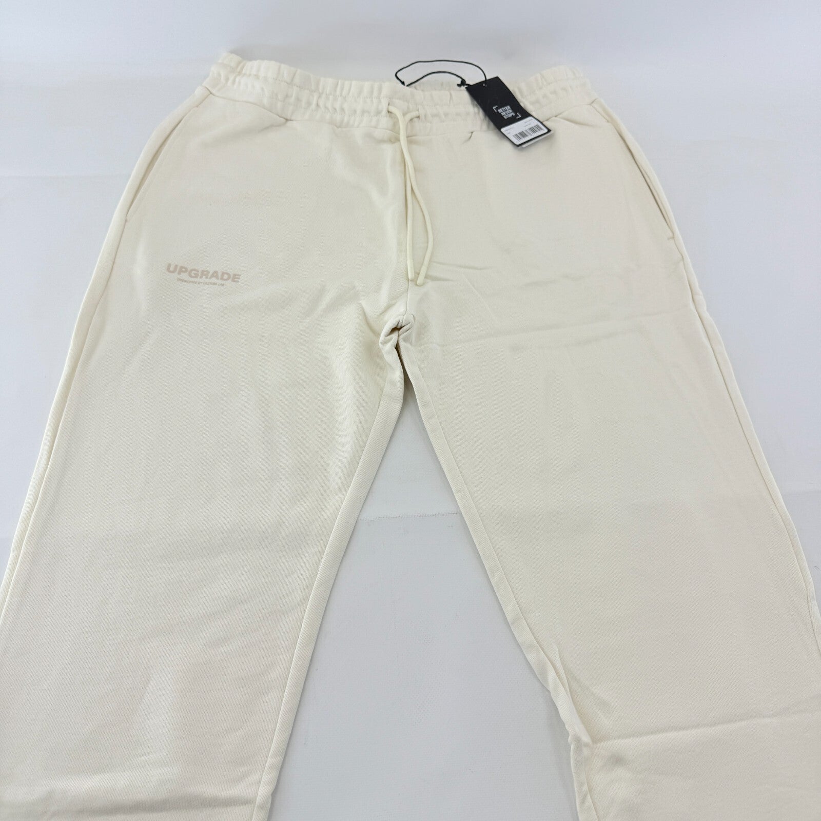 Castore Upgrade Mens Active Reverse Weave Joggers in Cream size XL New with Tags